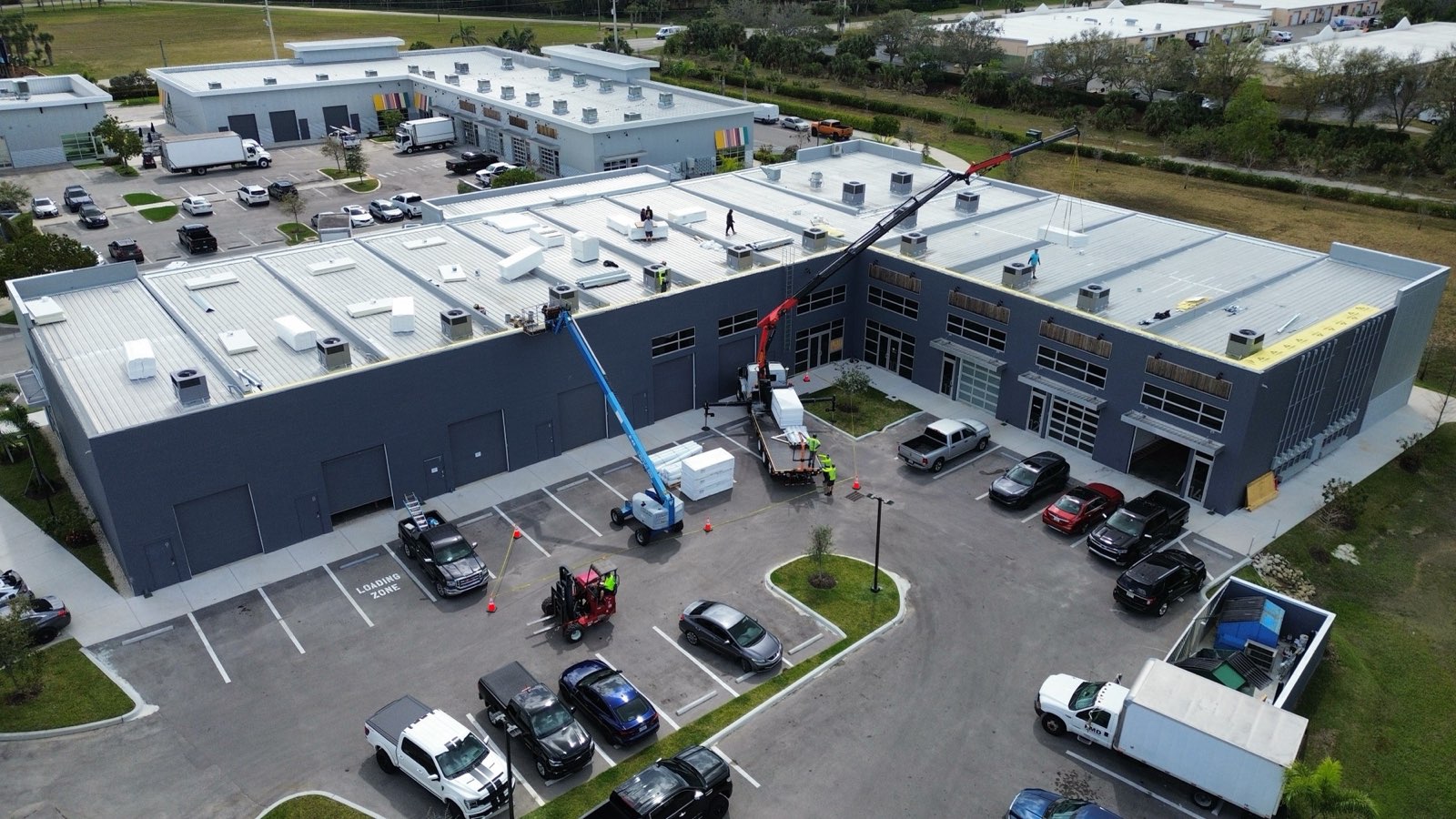 Induction-welded TPO commercial roof install in progress